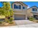 Charming two-story home with a landscaped yard and a two-car garage at 8295 Nebula Cloud Ave, Las Vegas, NV 89131
