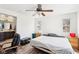 Primary bedroom featuring wood-look floors, and ample natural light at 8341 Lower Trailhead Ave, Las Vegas, NV 89113