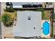 Aerial view showcasing the backyard pool, roof, and the surrounding landscaping at 836 Cherry Dr, Henderson, NV 89002