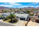 Single-Gathering home with desert landscaping, a two-car garage, and a meticulously maintained yard at 836 Cherry Dr, Henderson, NV 89002