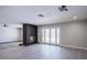 Modern living room with a unique fireplace, lots of natural light, and an open concept at 836 Cherry Dr, Henderson, NV 89002