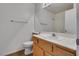 Bright bathroom featuring a vanity with a sink and a mirror at 8771 Martinique Bay Ln, Las Vegas, NV 89147