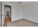 Cozy carpeted bedroom with a view into hallway at 8771 Martinique Bay Ln, Las Vegas, NV 89147