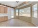 Open dining area with access to the backyard and featuring tile floors and natural light at 905 Star Pine Dr, Las Vegas, NV 89144
