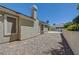 The exterior of the home with a view of the backyard and pool area at 905 Star Pine Dr, Las Vegas, NV 89144