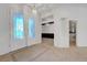 Bright entryway with decorative glass doors, tile flooring, and an elegant light fixture at 905 Star Pine Dr, Las Vegas, NV 89144