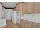 This spacious kitchen shows off double ovens, bright countertops, tile flooring, and lots of cabinet space at 905 Star Pine Dr, Las Vegas, NV 89144