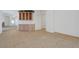 Open-concept living area featuring tile flooring, decorative shelving, and elegant finishes at 905 Star Pine Dr, Las Vegas, NV 89144