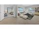 Stylishly furnished living room boasting large windows and comfortable seating arrangements at 905 Star Pine Dr, Las Vegas, NV 89144