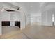 Spacious living area with tile flooring, built-in shelving, and abundant natural light at 905 Star Pine Dr, Las Vegas, NV 89144