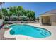 Beautiful swimming pool and hot tub with patio and garden providing an ideal backyard oasis for relaxation at 905 Star Pine Dr, Las Vegas, NV 89144
