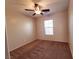 Bedroom featuring neutral walls, carpet and ceiling fan with natural light coming from single window at 9069 Tantalizing Ave, Las Vegas, NV 89149