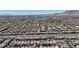 Wide aerial view showcasing a vast neighborhood with uniform houses, reflecting a well-planned community at 9950 Coyote Echo Ct, Las Vegas, NV 89166