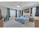 Bright main bedroom featuring a desk and neutral decor at 9950 Coyote Echo Ct, Las Vegas, NV 89166