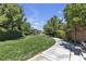 A community park with seating, walking paths, and shaded seating areas at 9950 Coyote Echo Ct, Las Vegas, NV 89166