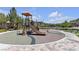 A view of the community playground including a slide and shady areas at 9950 Coyote Echo Ct, Las Vegas, NV 89166