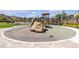 Community playground with climbing structures, picnic shelter, and play area at 9950 Coyote Echo Ct, Las Vegas, NV 89166