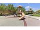 Community playground featuring slides, climbing structures, and covered picnic area at 9950 Coyote Echo Ct, Las Vegas, NV 89166