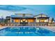 Inviting pool area with ample lounge chairs and a well-maintained pool with clear blue water, promising outdoor enjoyment at 9950 Coyote Echo Ct, Las Vegas, NV 89166