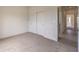 Bedroom featuring a closet with sliding doors and carpet flooring at 10421 Linfield Pl, Las Vegas, NV 89134