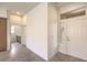 Inviting entryway with natural light and tile flooring leading into a home's interior at 10421 Linfield Pl, Las Vegas, NV 89134