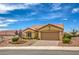 Charming one story home has manicured landscaping and a brick driveway at 10421 Linfield Pl, Las Vegas, NV 89134