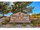 Highland Falls Golf Club welcomes you with manicured flower beds at 10421 Linfield Pl, Las Vegas, NV 89134