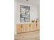 Close up of the living room showing the storage cabinets, and artwork at 10709 Hunters Woods Pl, Las Vegas, NV 89134