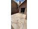 Spacious backyard featuring a large concrete patio, fence and block wall at 1081 Overture Dr, Las Vegas, NV 89123