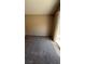 Bedroom with carpet flooring, natural light, and a sliding glass door at 1081 Overture Dr, Las Vegas, NV 89123