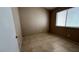 Bedroom with neutral paint and tile flooring, lit by a window with blinds at 1081 Overture Dr, Las Vegas, NV 89123