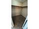 Walk-in closet with carpet flooring and hanging racks for storage at 1081 Overture Dr, Las Vegas, NV 89123