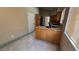 Cozy kitchen with tile countertops, stainless steel appliances, and a functional layout at 1081 Overture Dr, Las Vegas, NV 89123