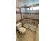Bathroom with a shower, tile surround, and a toilet at 1081 Overture Dr, Las Vegas, NV 89123