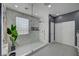 Gorgeous main bathroom featuring a large, luxurious glass shower with elegant marble tiling at 11417 Rock Cove Way, Las Vegas, NV 89141