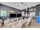 Inviting entertainment room with recliner chairs, dual screens, and decor at 11417 Rock Cove Way, Las Vegas, NV 89141