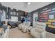 Spacious game room with viewing area, arcade game, and themed decor at 11417 Rock Cove Way, Las Vegas, NV 89141