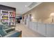 Hallway with hardwood floors, a bookshelf, console, and neutral paint at 11417 Rock Cove Way, Las Vegas, NV 89141