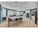 Stylish kitchen with a large island, seating, and stainless steel appliances at 11417 Rock Cove Way, Las Vegas, NV 89141