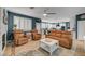 Open-concept floor plan featuring a comfortable living room area with access to the kitchen at 11417 Rock Cove Way, Las Vegas, NV 89141