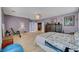 Spacious main bedroom featuring wood floors, large windows, neutral decor and a comfortable feel at 11417 Rock Cove Way, Las Vegas, NV 89141