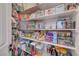 Walk-in pantry with shelves full of food items in organized containers at 11417 Rock Cove Way, Las Vegas, NV 89141