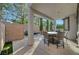 Covered patio featuring a round table and chairs, perfect for outdoor dining and entertaining at 11417 Rock Cove Way, Las Vegas, NV 89141