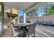 Spacious covered patio featuring a round table, seating and outdoor furniture at 11417 Rock Cove Way, Las Vegas, NV 89141