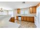 Bright kitchen features white appliances and ample counter space at 11577 Vesuvio Ct, Las Vegas, NV 89183