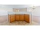 Kitchen island bar with seating that opens to the living room at 11577 Vesuvio Ct, Las Vegas, NV 89183
