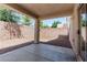 Back patio with gravel and concrete, covered by a solid roof at 11577 Vesuvio Ct, Las Vegas, NV 89183