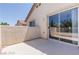 Enclosed patio with stucco walls, offering a private outdoor space at 11577 Vesuvio Ct, Las Vegas, NV 89183