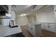 Modern kitchen showcasing an island, quartz countertops, and white cabinetry at 1180 Lava Ave, Jean, NV 89019