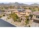 Gorgeous home showcasing meticulous landscaping, a unique architectural design, and convenient access to neighborhood amenities at 12116 Vista Linda Ave, Las Vegas, NV 89138